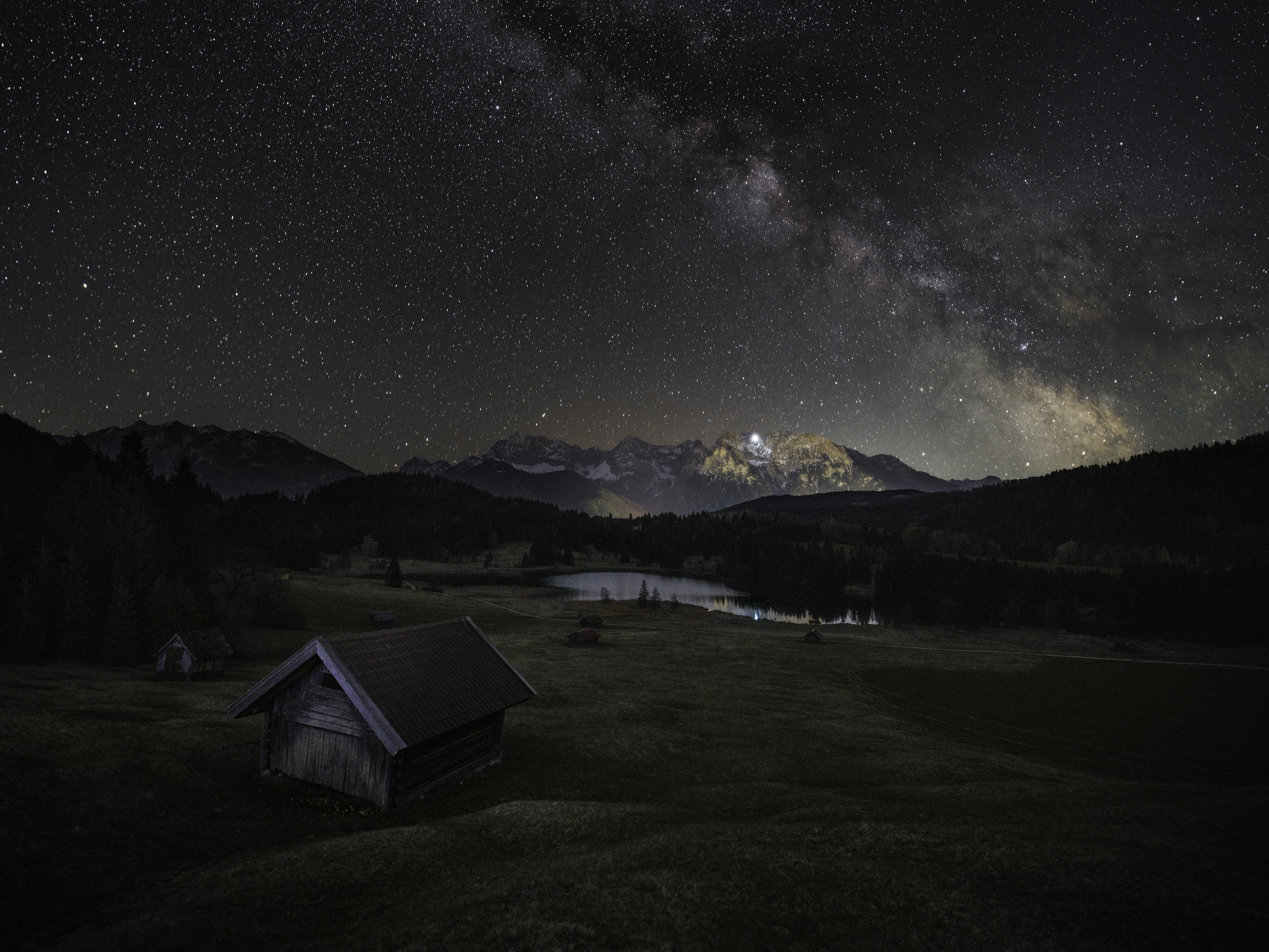 The Milky Way galactic core arching low over a southern horizon