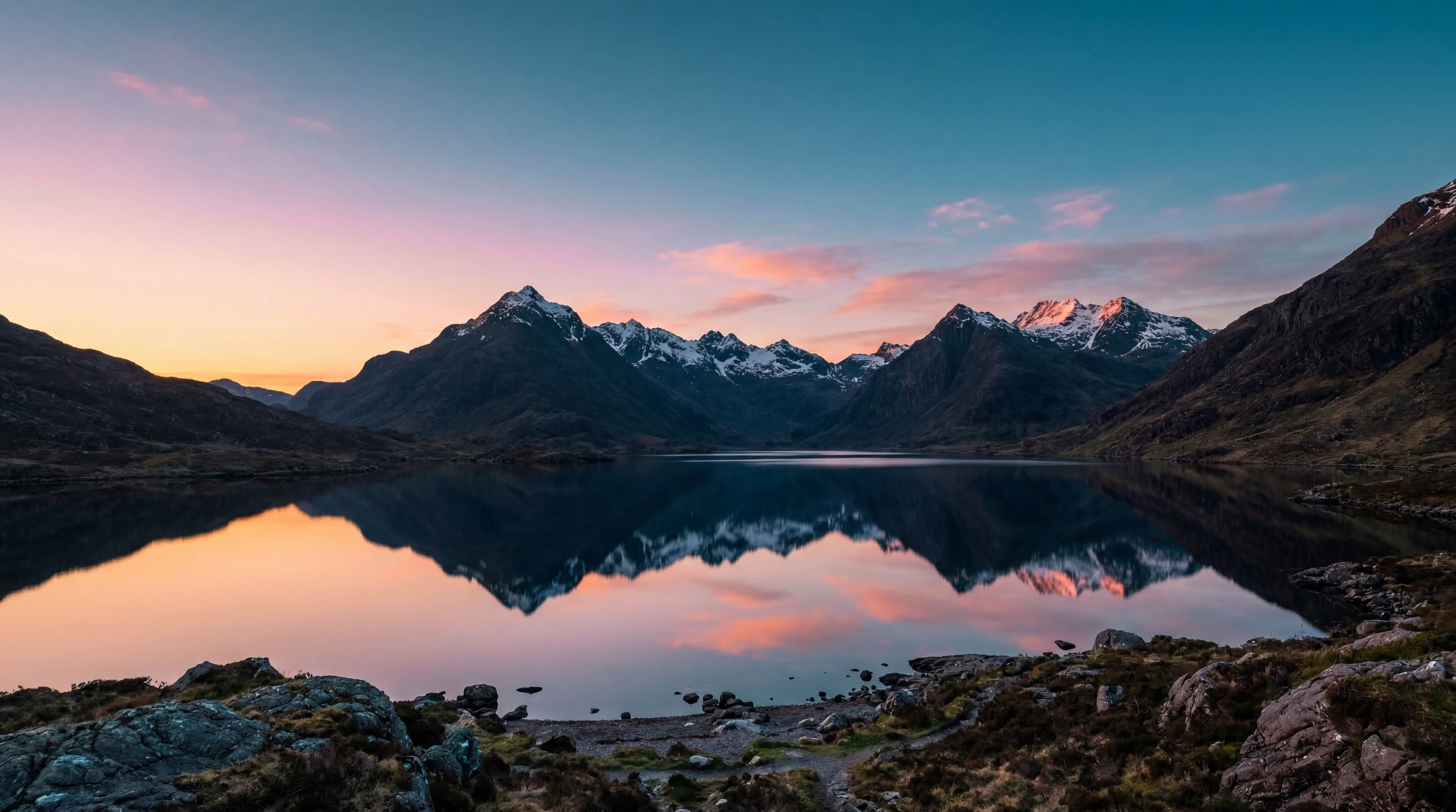 Serene mountain lake at blue hour